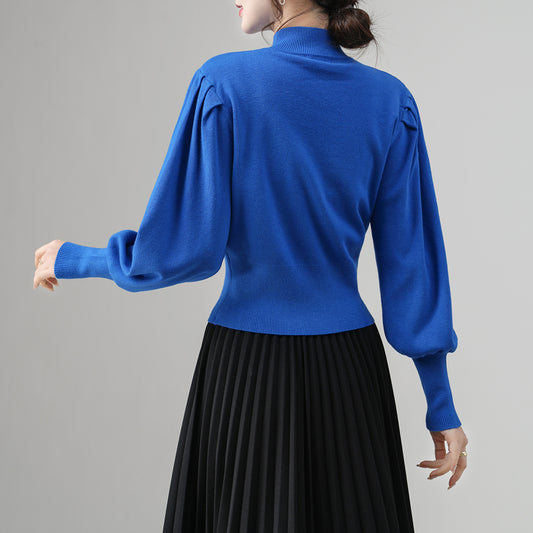 Suéter de punto para mujer al por mayor: Top con mangas abullonadas y detalle de cadena | Moda Otoño-Invierno